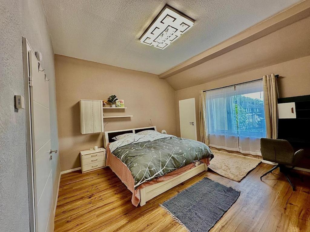 a bedroom with a bed and a window at 2-room apartment with attached bathroom No Kitchen in Gelsenkirchen