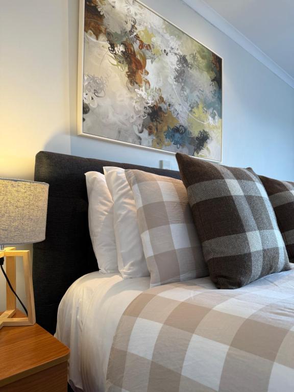 Postel nebo postele na pokoji v ubytování ASURE Ascot Motor Inn