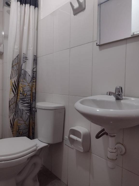 Et badeværelse på LA ACOGEDORA Qori Wasi