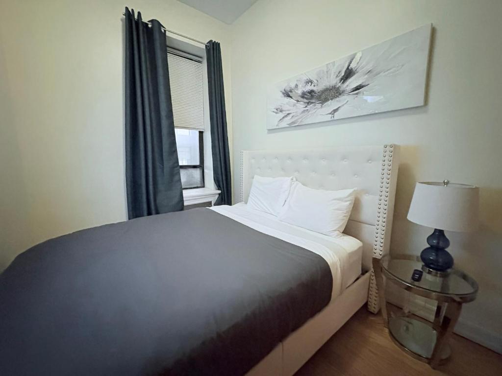 Postel nebo postele na pokoji v ubytování The Marlow Midtown