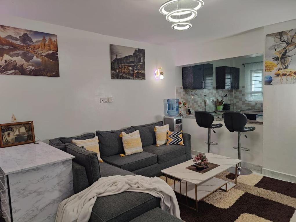 Χώρος καθιστικού στο Cozy Modern Apartment in Ruiru and Fully Equipped