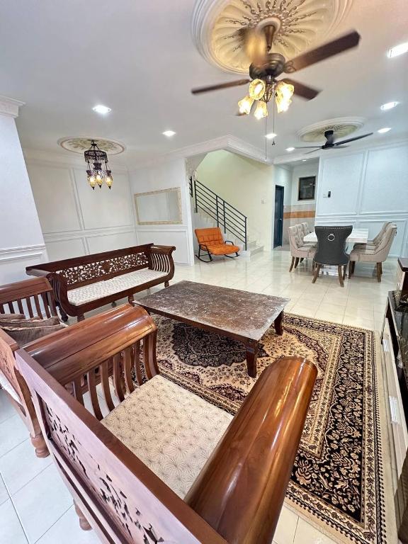 Posezení v ubytování Rumah Eve Taman Banting Baru