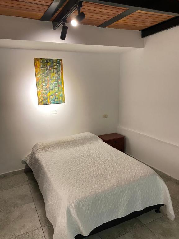 Postel nebo postele na pokoji v ubytování Apartaestudio monoambiente 100