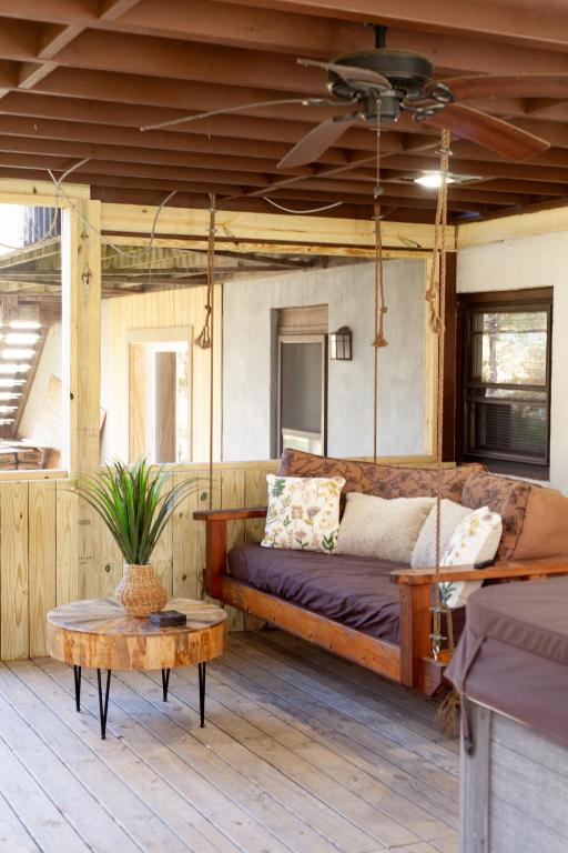 a living room with a couch and a table at O'Brien's Sanctuary in Candler