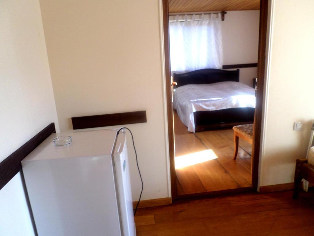 Postel nebo postele na pokoji v ubytování Gosh hotel