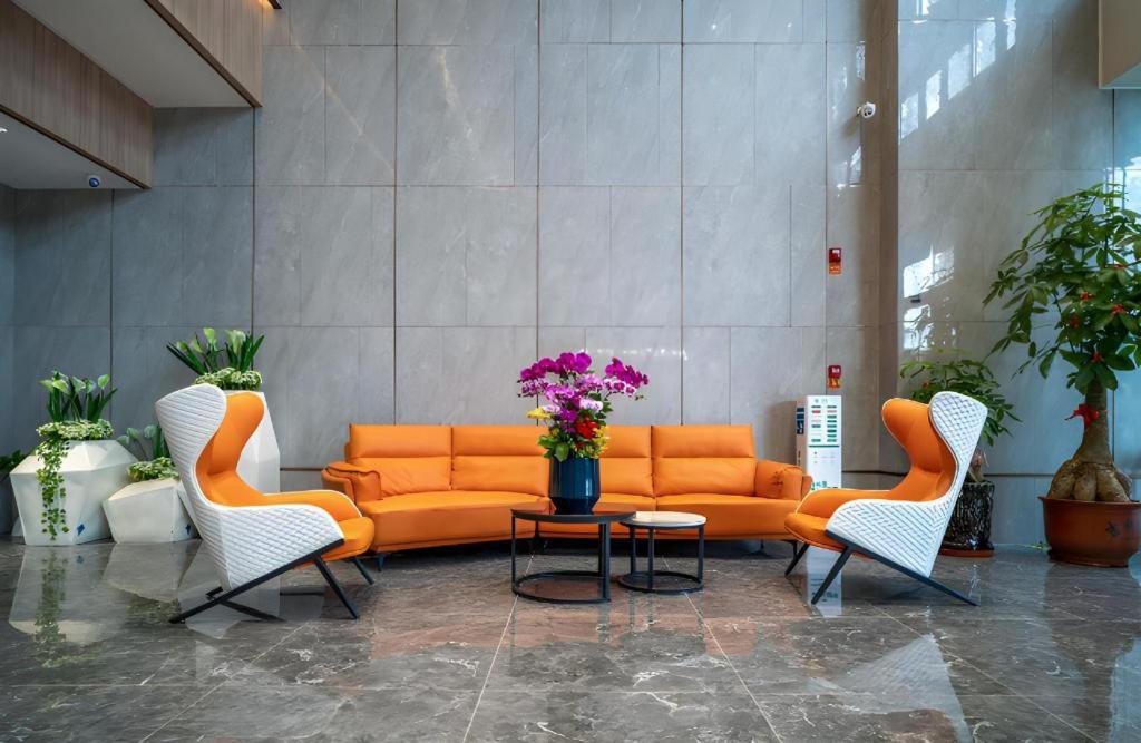 Posezení v ubytování Borrman Hotel Zhangzhou Baolong Plaza