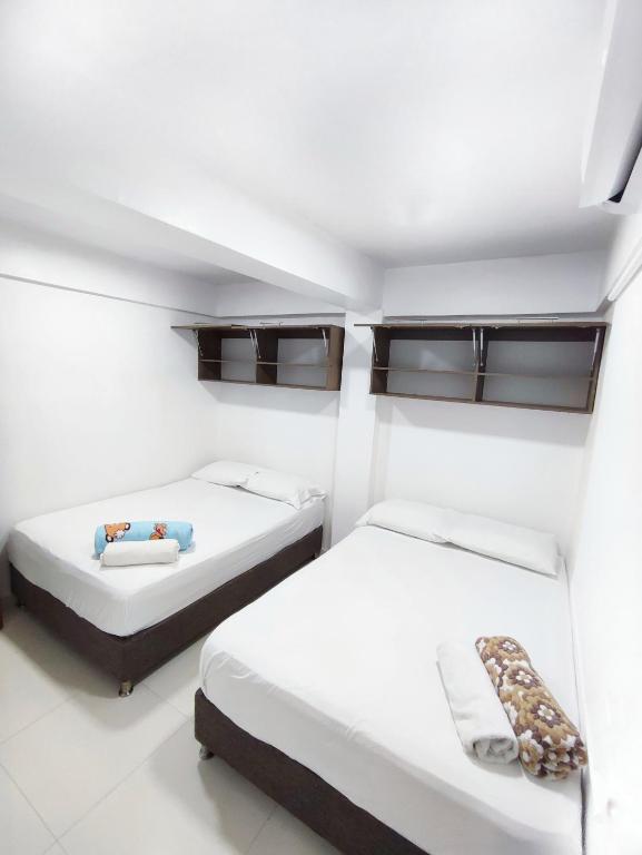 Postel nebo postele na pokoji v ubytování Apartamentos Sophia