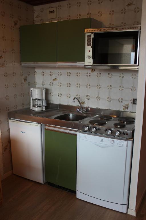 Kuchyň nebo kuchyňský kout v ubytování Serac Appartements VTI