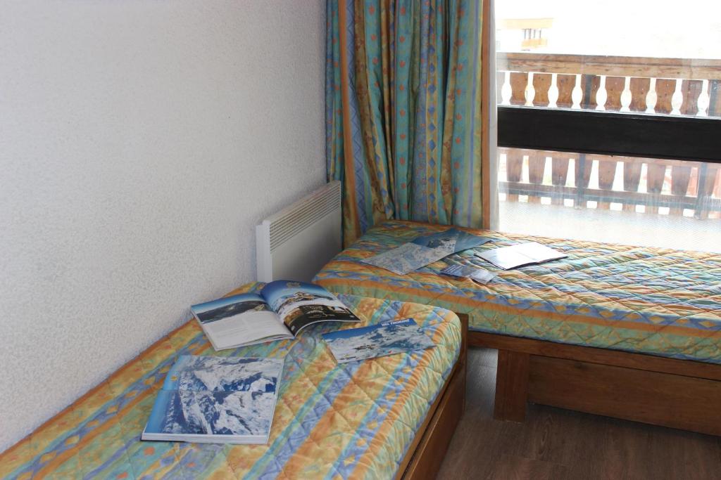 Postel nebo postele na pokoji v ubytování Serac Appartements VTI