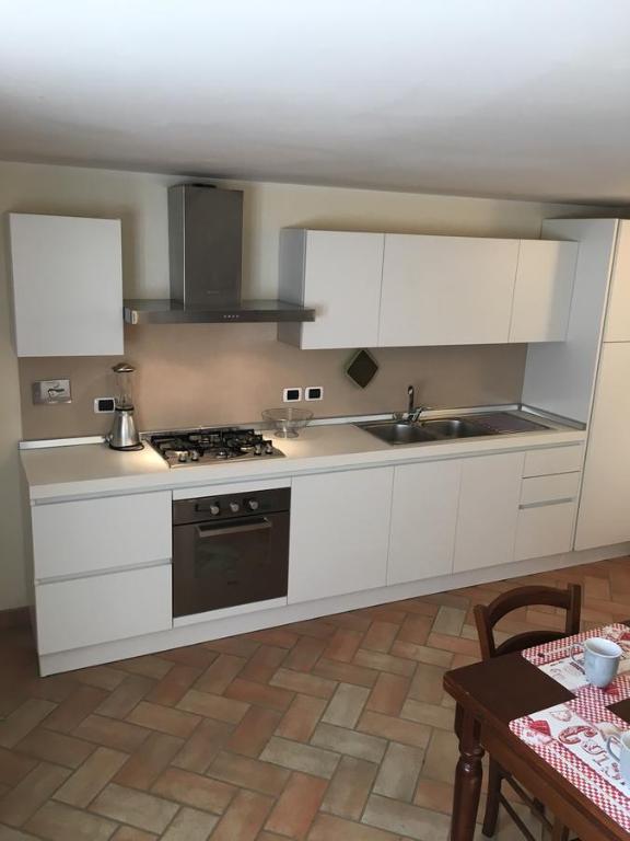 A kitchen or kitchenette at Alle Porte di Assisi