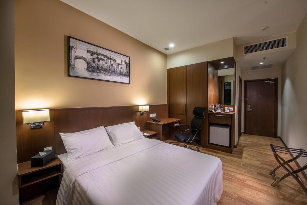 Postel nebo postele na pokoji v ubytování Keoja Hotel