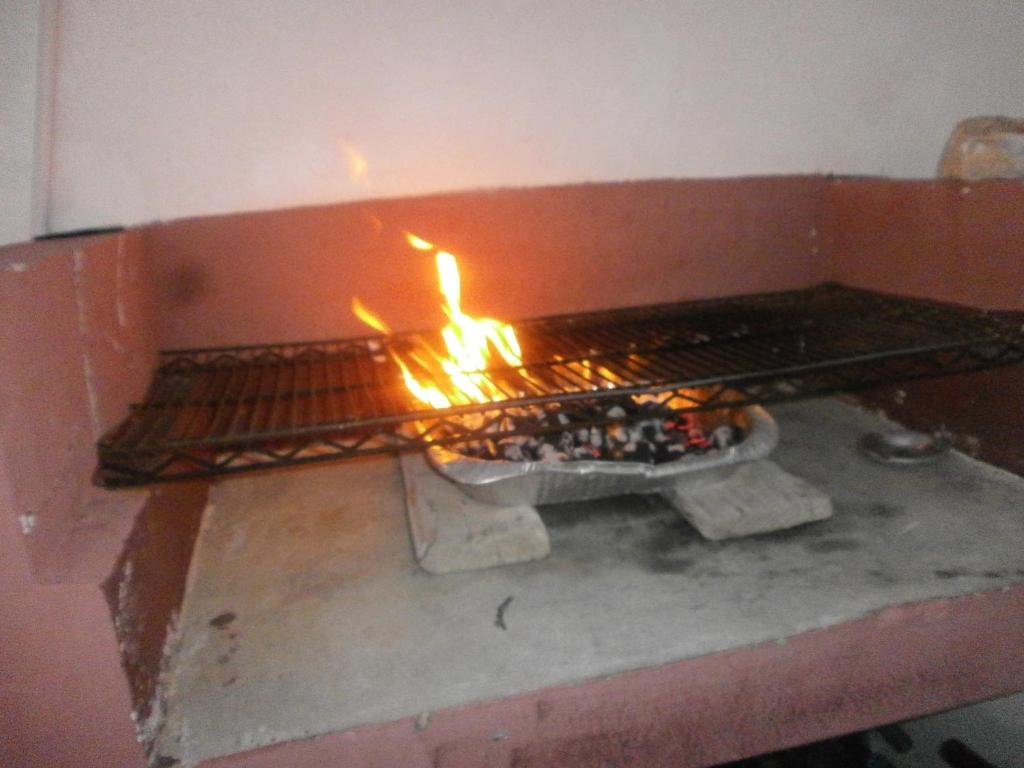 Gril dostupný pro hosty v penzionu