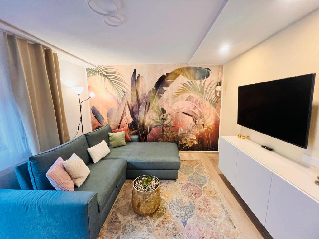 TV a/nebo společenská místnost v ubytování Natal Gian