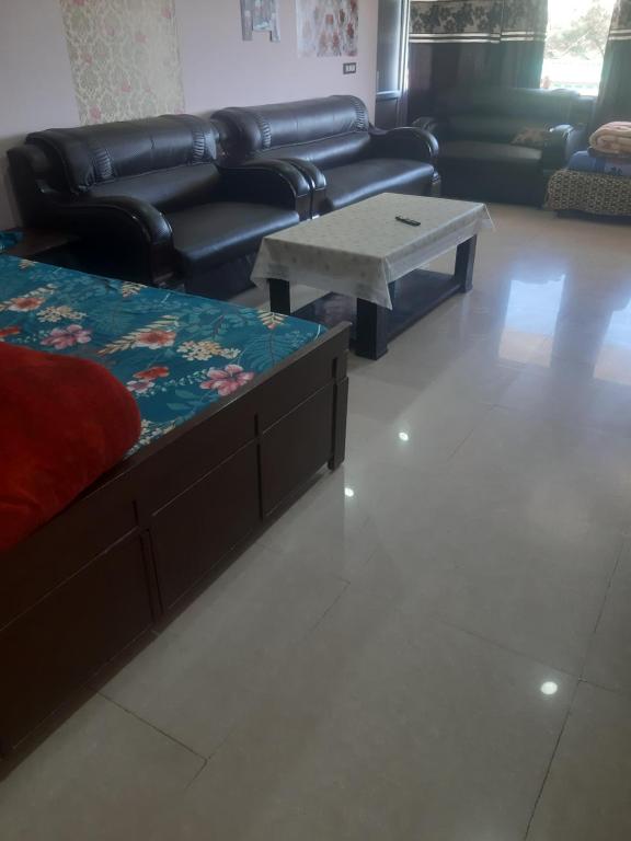 Posezení v ubytování Surbhi Homestay