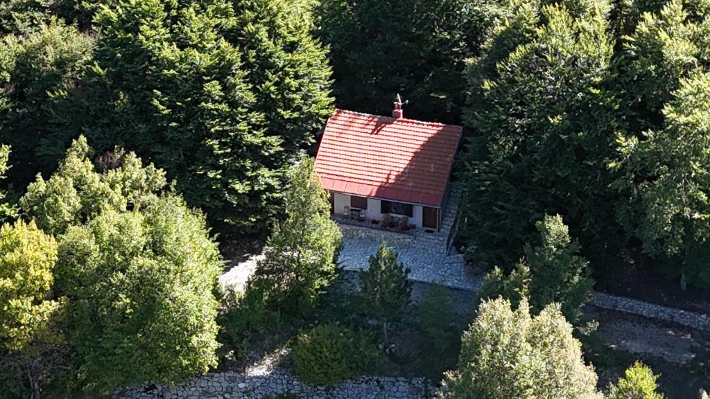 an aerial view of a house with a red roof at Vikendica Silenzio in Cetinje