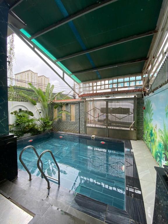 Bazén v ubytování HOMESTAY 172A Ho Quy Ly BAI SAU nebo v jeho okolí