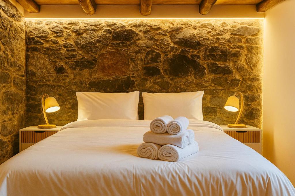 Ένα ή περισσότερα κρεβάτια σε δωμάτιο στο JoLi Larano - BBQ In