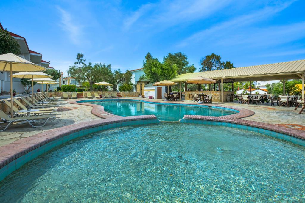 Bazén v ubytování Serenity Garden House nebo v jeho okolí