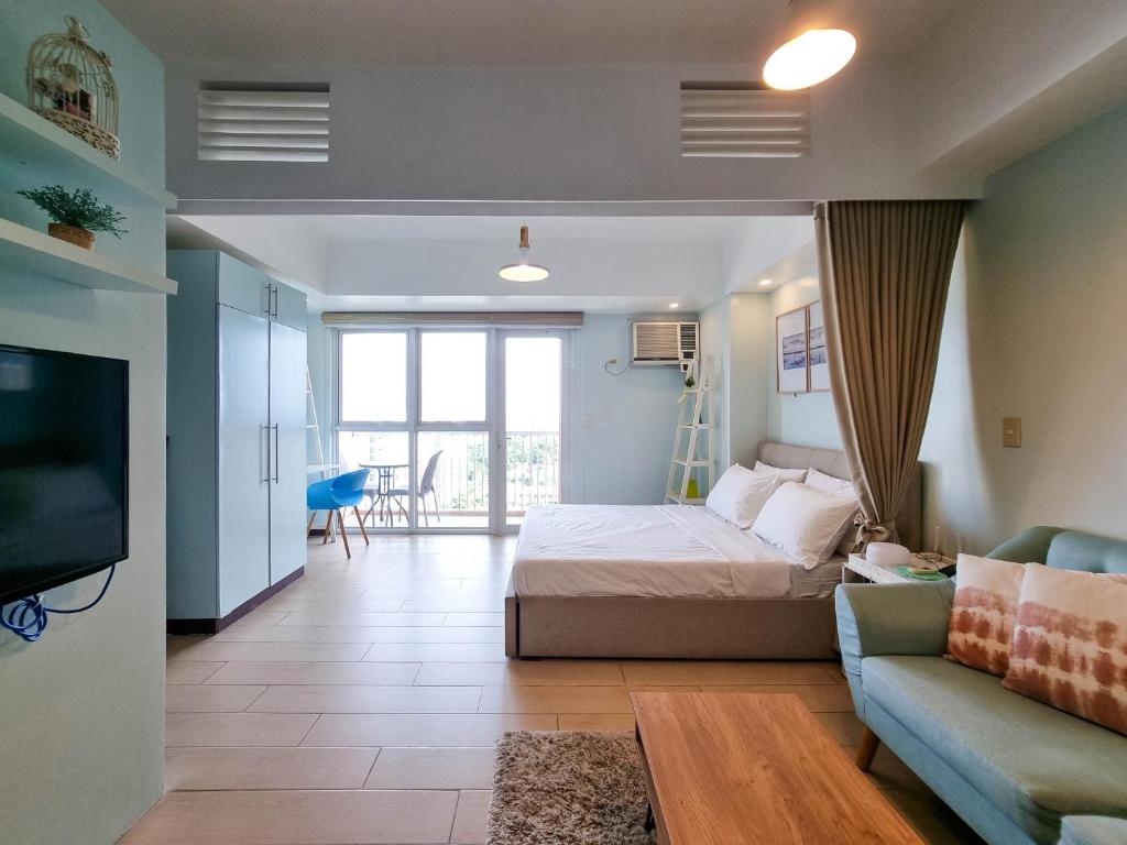 Postel nebo postele na pokoji v ubytování Stunning View 1BR Venice Luxury Residences BGC Ultra Fast WiFi and Washer