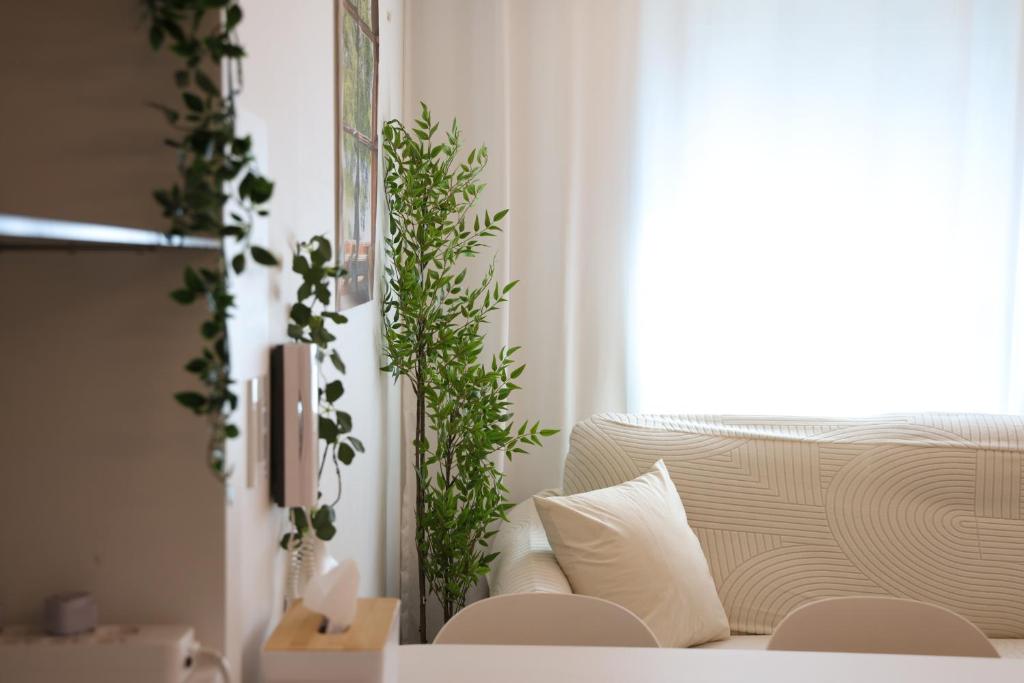 Una cama o camas en una habitación de HONGDAE t HOUSE