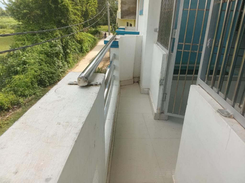 En balkon eller terrasse på Krishna Home stay