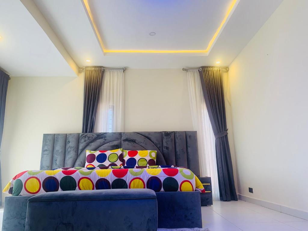 Ένα ή περισσότερα κρεβάτια σε δωμάτιο στο Lanosa Stay, Wuye