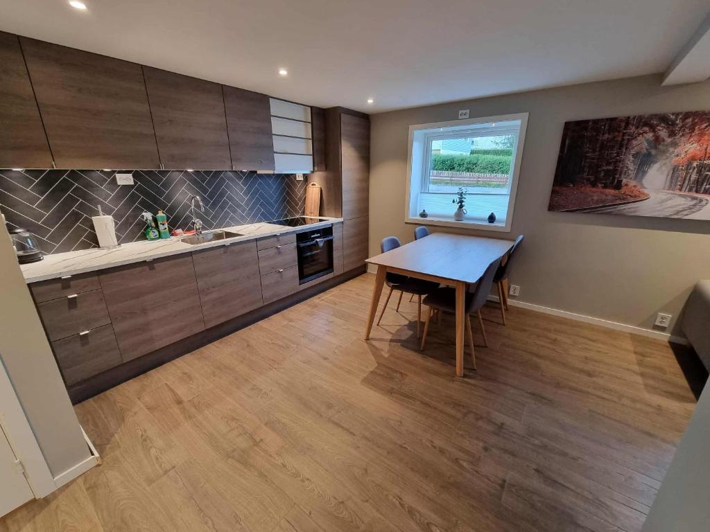 Køkken eller tekøkken på Sentral leilighet