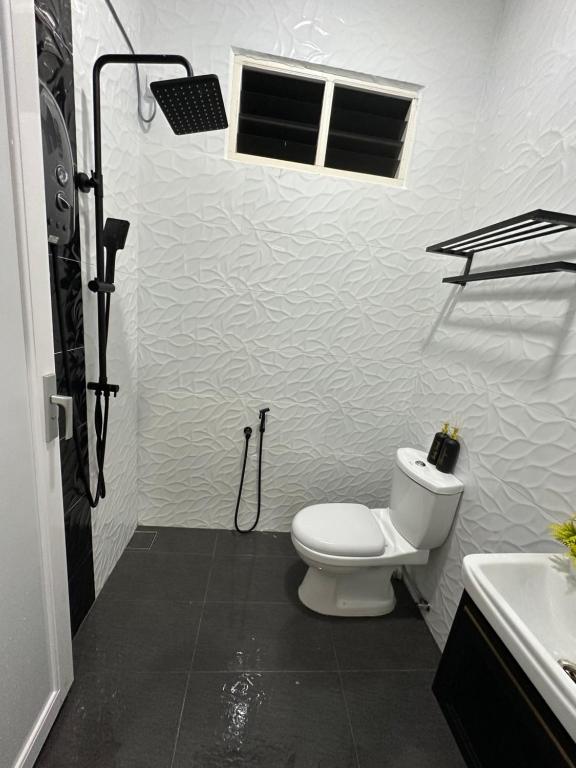 Koupelna v ubytování The Payong House