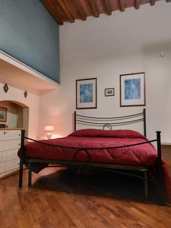 Ένα ή περισσότερα κρεβάτια σε δωμάτιο στο La casa di Aaron