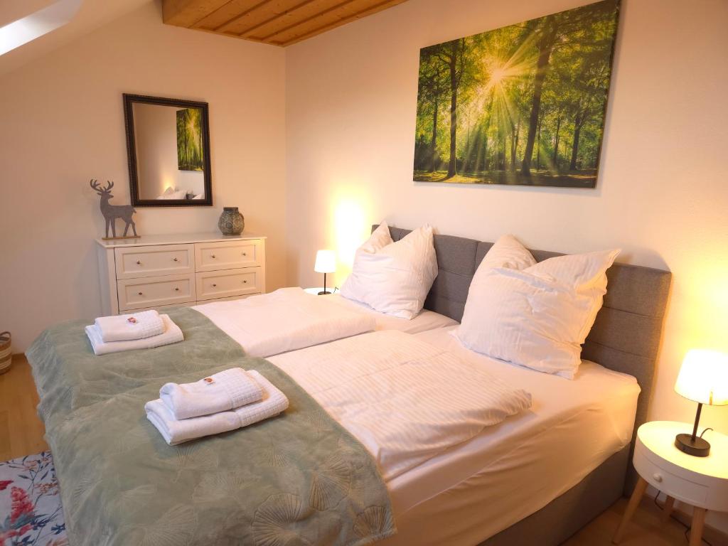 Ένα ή περισσότερα κρεβάτια σε δωμάτιο στο Rost Apartments - Staffelsee