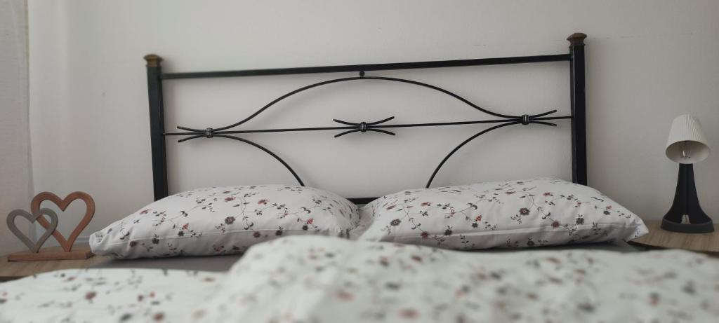 Ένα ή περισσότερα κρεβάτια σε δωμάτιο στο Apartman Maja 46