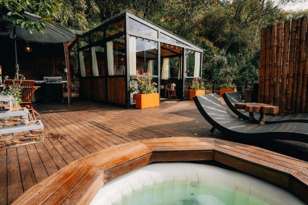 Κήπος έξω από το Cabaña Ocaso Forest El Retiro