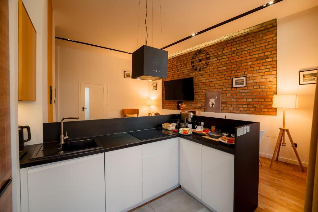 Køkken eller tekøkken på Apartment by Cathedral