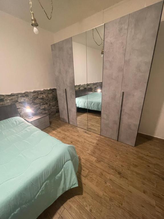 Ένα ή περισσότερα κρεβάτια σε δωμάτιο στο Attanasio Home