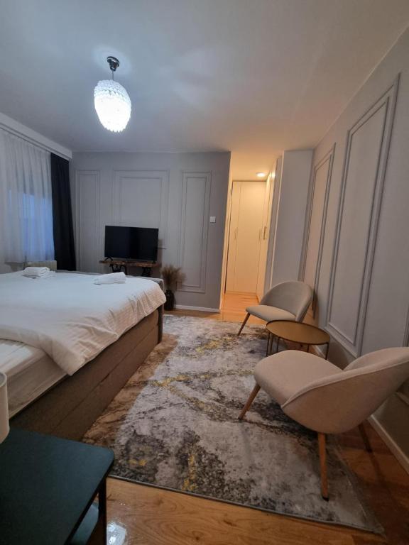 Postel nebo postele na pokoji v ubytování Apartman Helena - Self check in