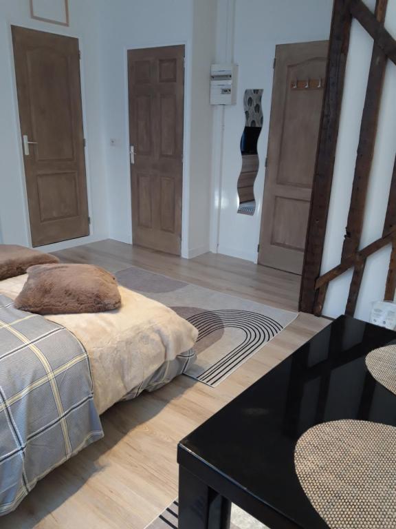 Voodi või voodid majutusasutuse TINCHEBRAY Centre ville toas