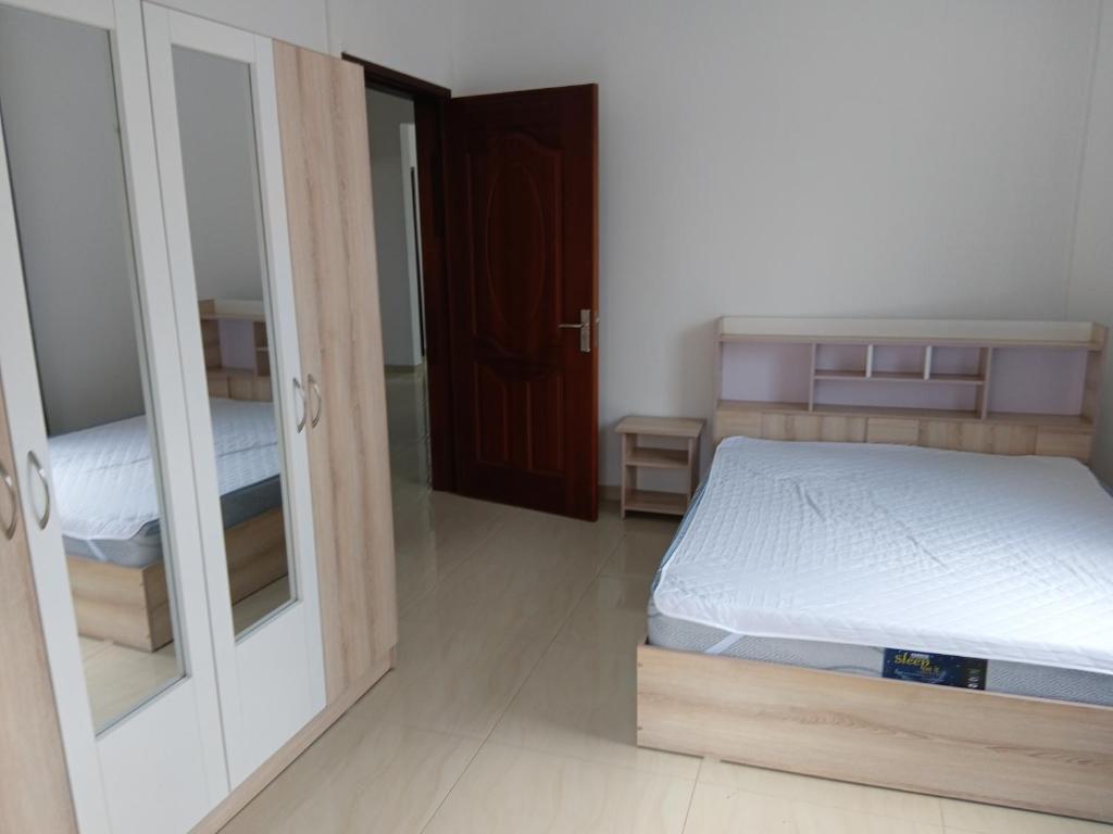 Ένα ή περισσότερα κρεβάτια σε δωμάτιο στο Villa ariff