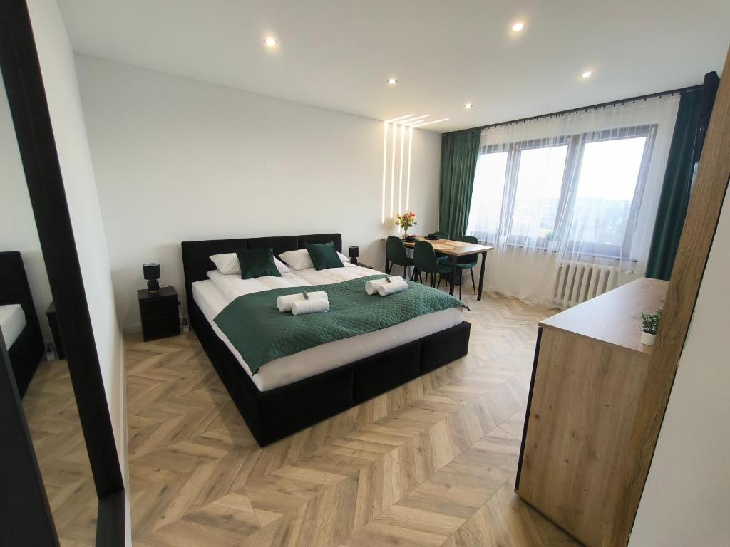 Postel nebo postele na pokoji v ubytování Modern Home