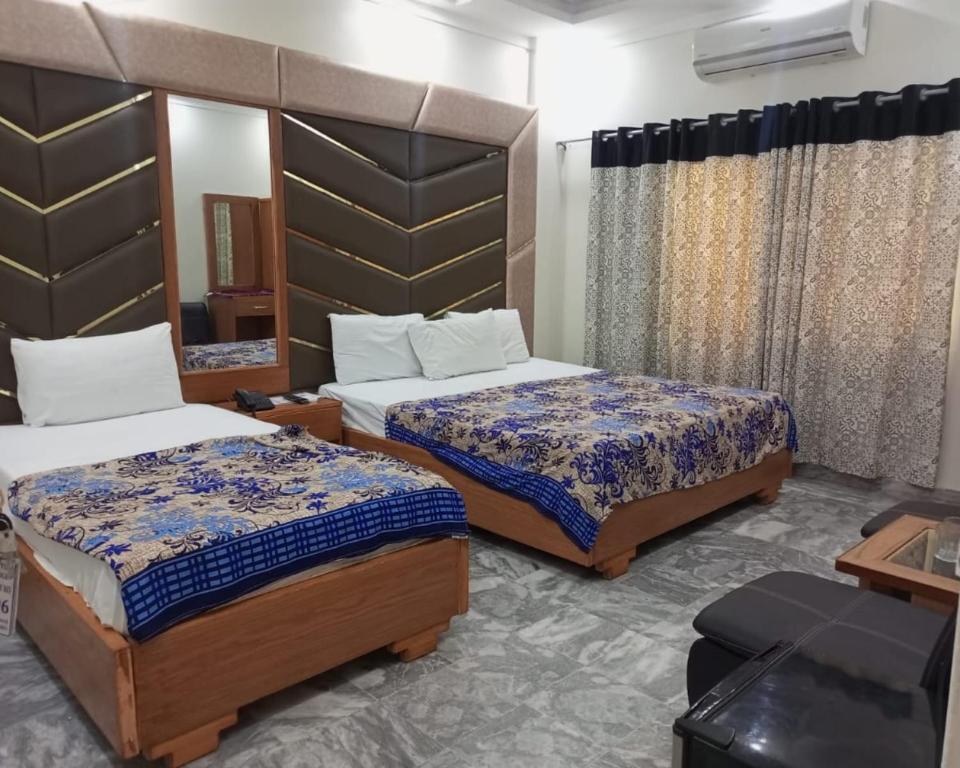 Ένα ή περισσότερα κρεβάτια σε δωμάτιο στο Clifton BnB