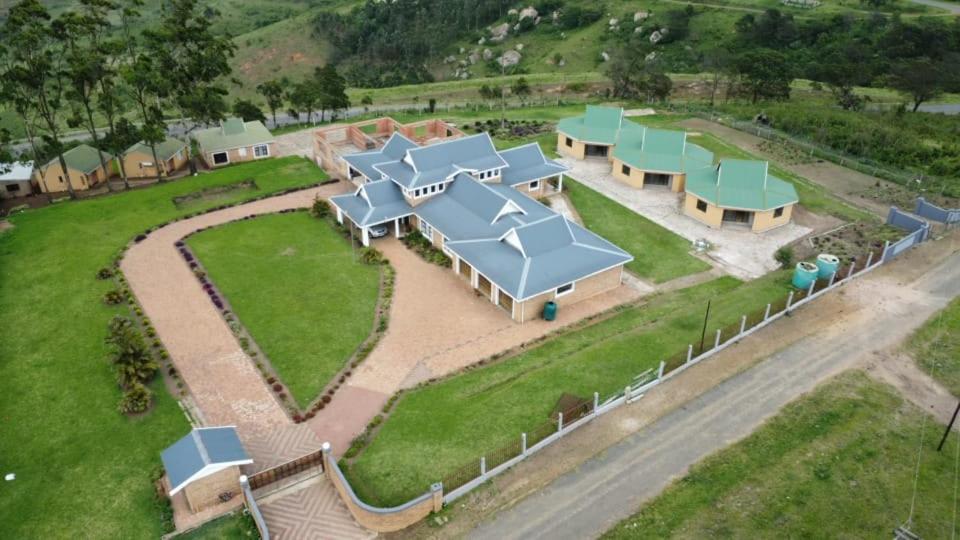 an overhead view of a park with many buildings at Maison Royale Lodge in Nongoma