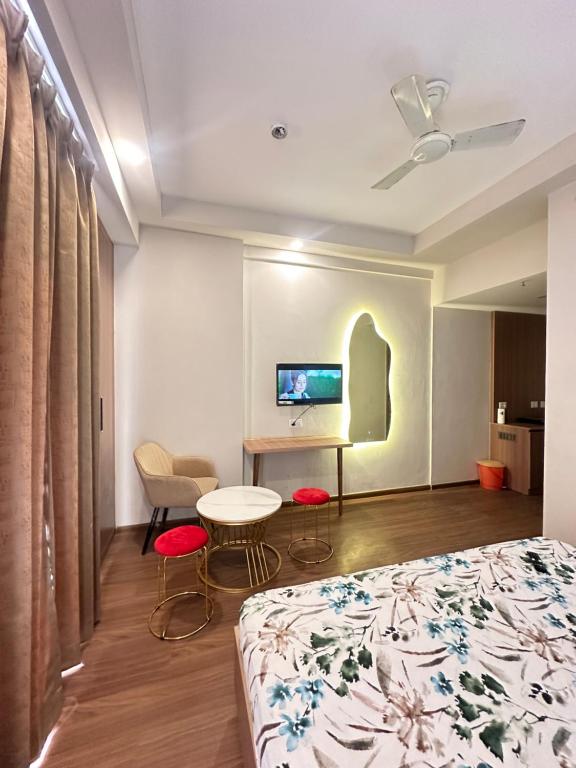 Ένα ή περισσότερα κρεβάτια σε δωμάτιο στο Paradise stay