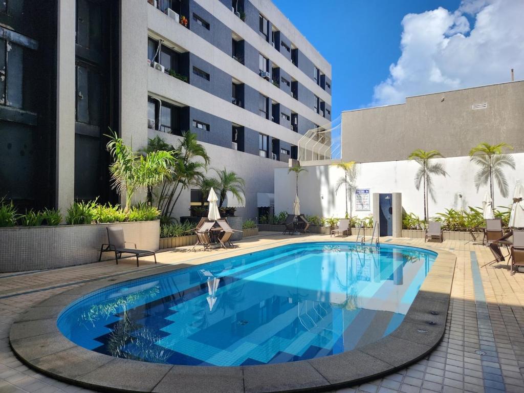 Πισίνα στο ή κοντά στο Aconchego de Apartamento Conforto de hotel, localização TOP