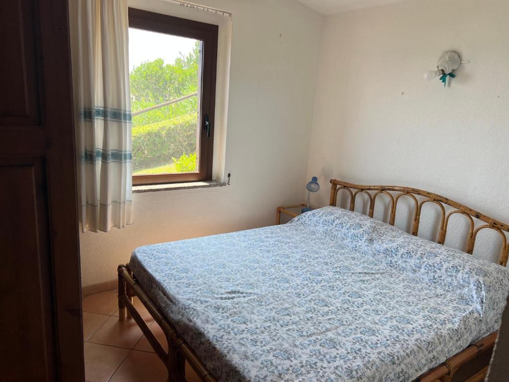 Ένα ή περισσότερα κρεβάτια σε δωμάτιο στο Villa Rei - 180 Grad Panoramablick aufs Meer und Strandnähe