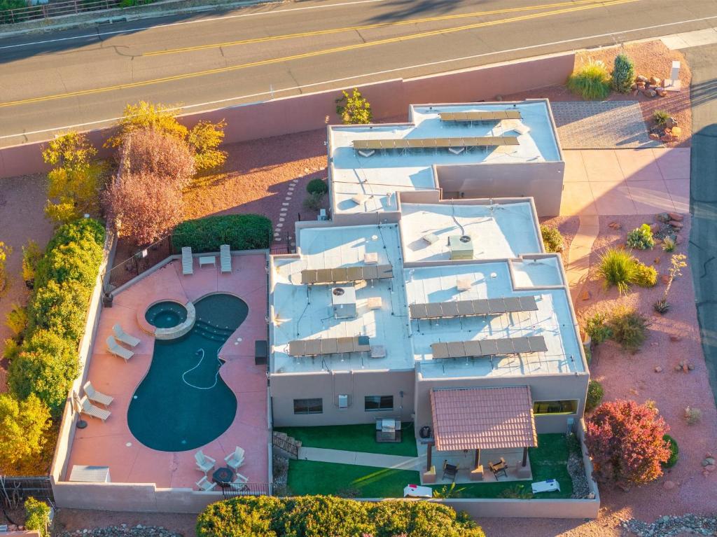 an aerial view of a house with a backyard at 3BD-2BA Heated Pool & Spa Fire-pit BBQ Billiards in Sedona