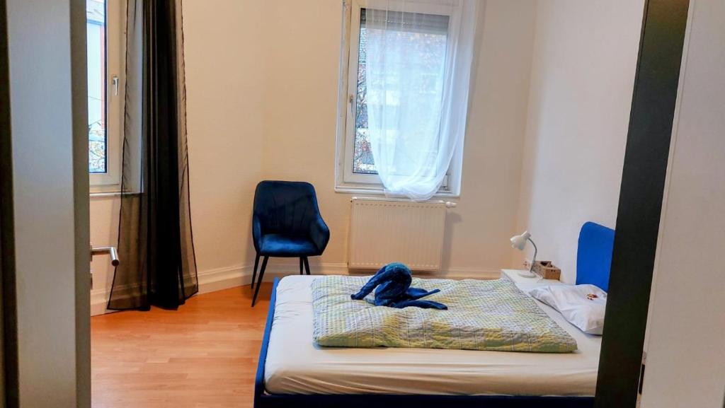 Ένα ή περισσότερα κρεβάτια σε δωμάτιο στο Eastside - Privatzimmer in geteilter Wohnung mit Gemeinschaftsbad