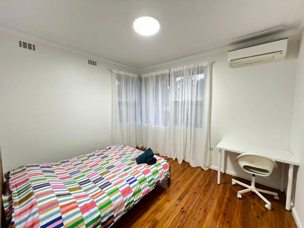 Postel nebo postele na pokoji v ubytování Room 92