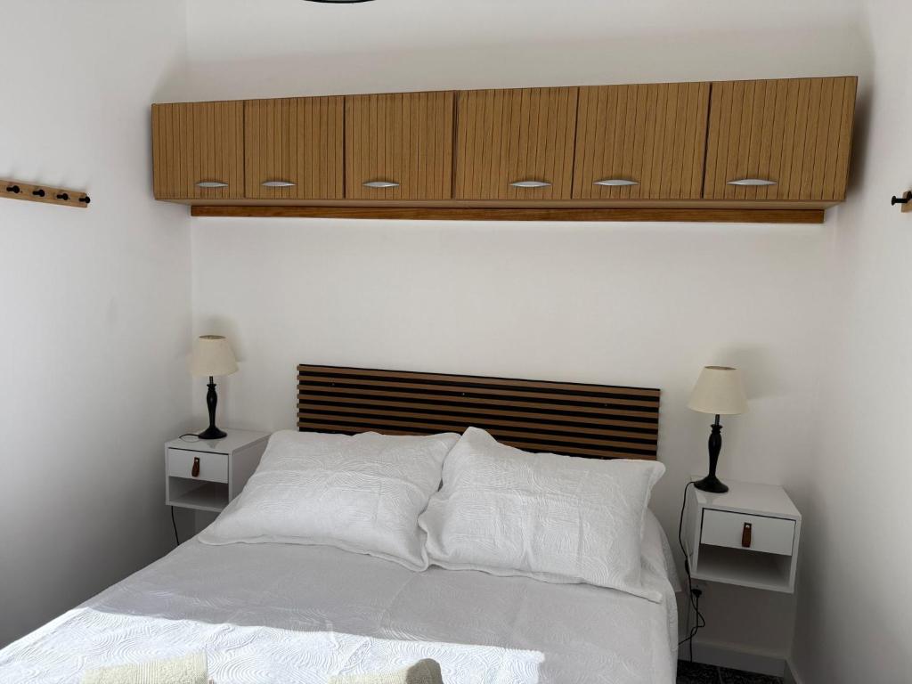 Ένα ή περισσότερα κρεβάτια σε δωμάτιο στο Casa céntrica