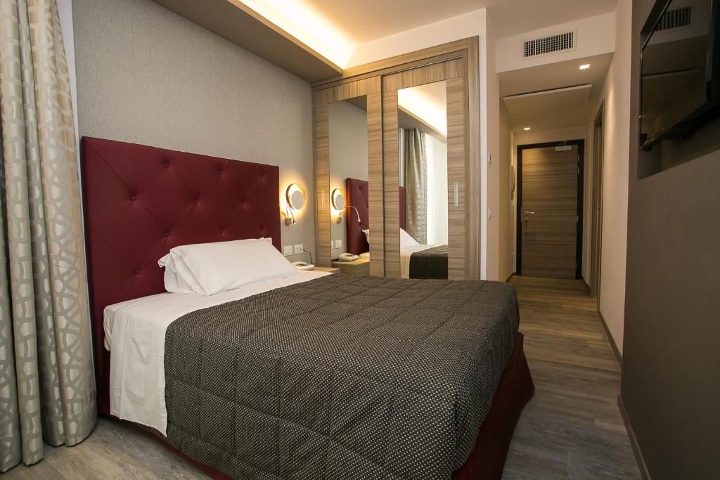 Postel nebo postele na pokoji v ubytování Hotel Terme Abano Verdi