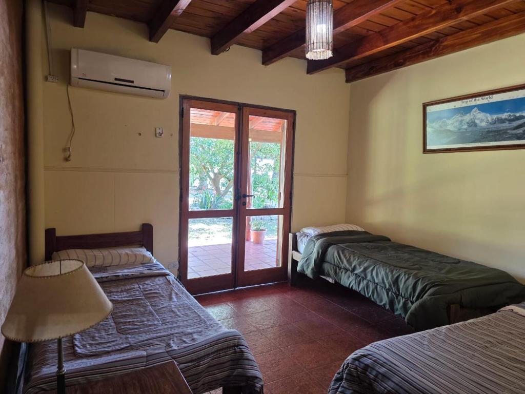 Postel nebo postele na pokoji v ubytování Cabañas Lodge Angirú