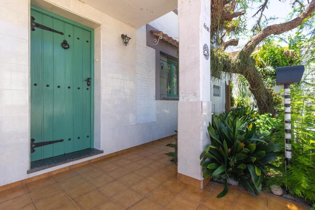 Κήπος έξω από το Casa del arbol hostel